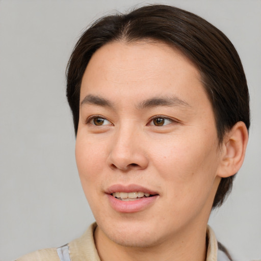 Joyful white young-adult male with medium  brown hair and brown eyes