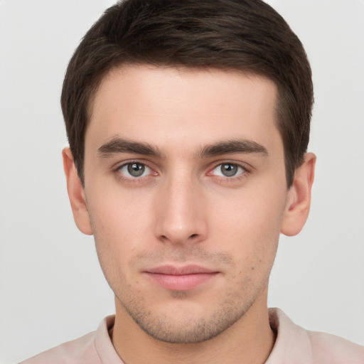 Neutral white young-adult male with short  brown hair and brown eyes