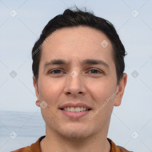 Joyful white young-adult male with short  brown hair and brown eyes