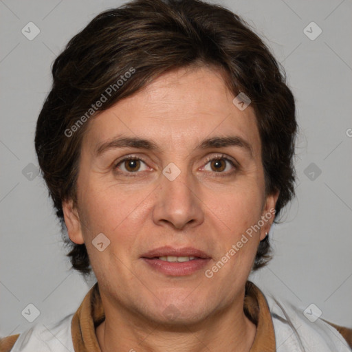 Joyful white adult female with short  brown hair and brown eyes