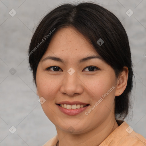 Joyful asian young-adult female with medium  brown hair and brown eyes