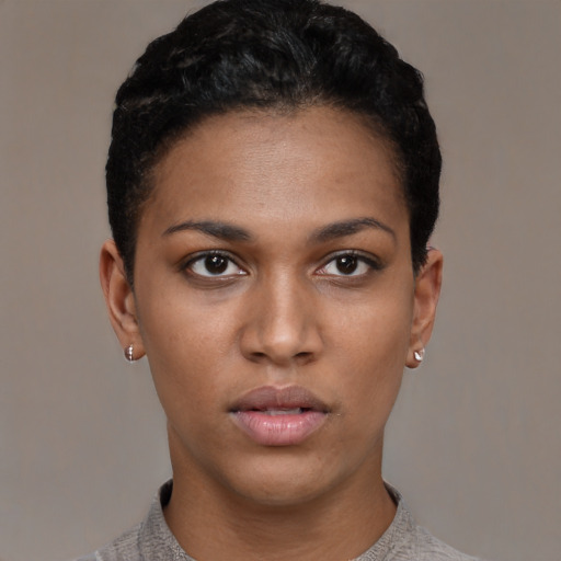 Neutral latino young-adult female with short  black hair and brown eyes