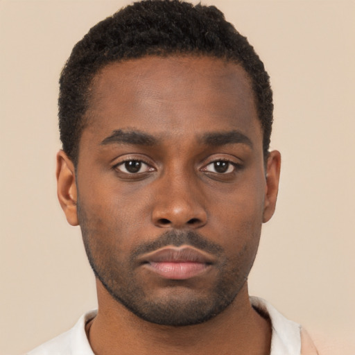 Neutral black young-adult male with short  brown hair and brown eyes