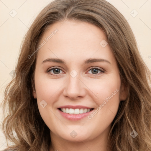 Joyful white young-adult female with long  brown hair and green eyes