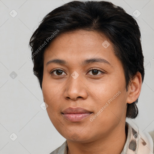 Joyful asian young-adult female with medium  brown hair and brown eyes