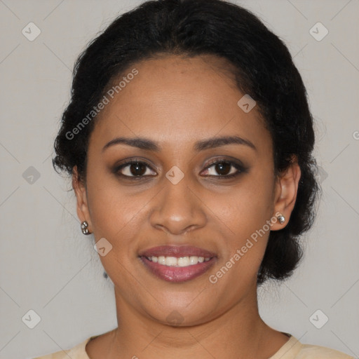 Joyful black young-adult female with short  black hair and brown eyes