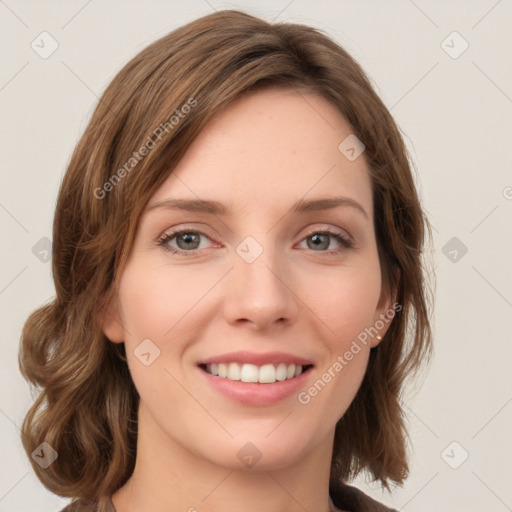 Joyful white young-adult female with medium  brown hair and green eyes