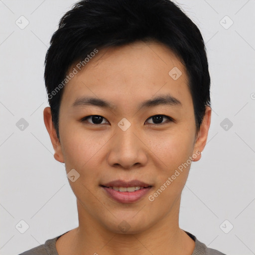 Joyful asian young-adult male with short  black hair and brown eyes