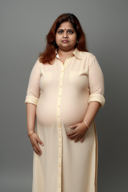 Indian middle-aged female with  ginger hair