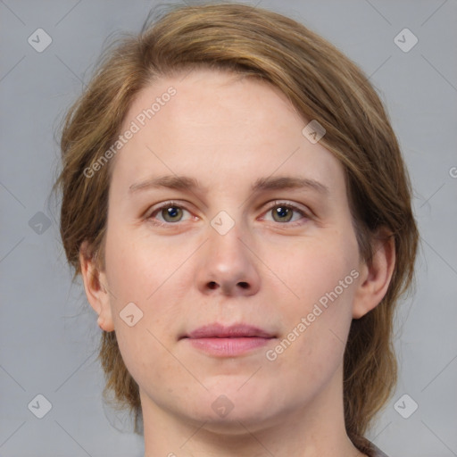 Joyful white young-adult female with medium  brown hair and green eyes