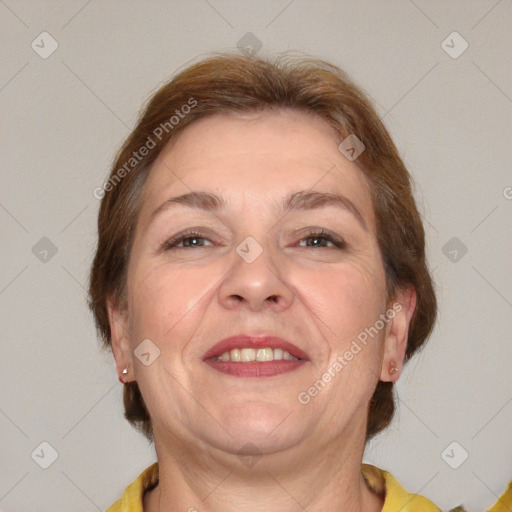 Joyful white adult female with short  brown hair and brown eyes