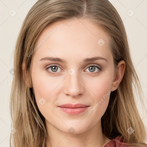 Joyful white young-adult female with long  brown hair and grey eyes