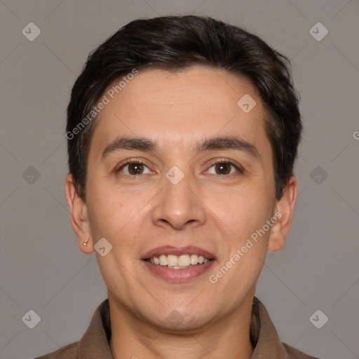 Joyful white adult male with short  brown hair and brown eyes