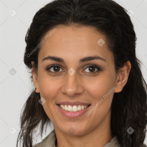 Joyful latino young-adult female with long  brown hair and brown eyes