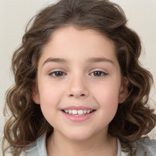 Joyful white child female with medium  brown hair and brown eyes