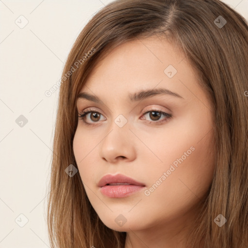 Neutral white young-adult female with long  brown hair and brown eyes