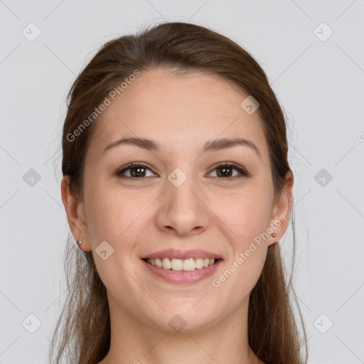 Joyful white young-adult female with long  brown hair and grey eyes