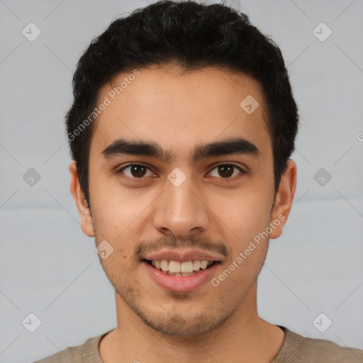 Joyful latino young-adult male with short  black hair and brown eyes