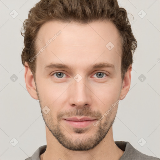 Neutral white young-adult male with short  brown hair and grey eyes