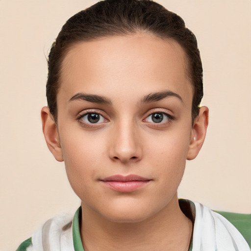 Neutral white young-adult female with short  brown hair and brown eyes