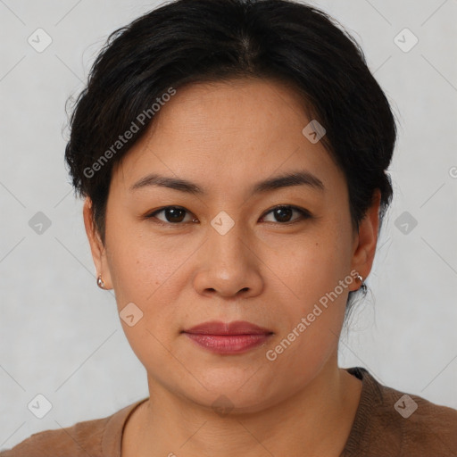 Joyful asian young-adult female with short  brown hair and brown eyes