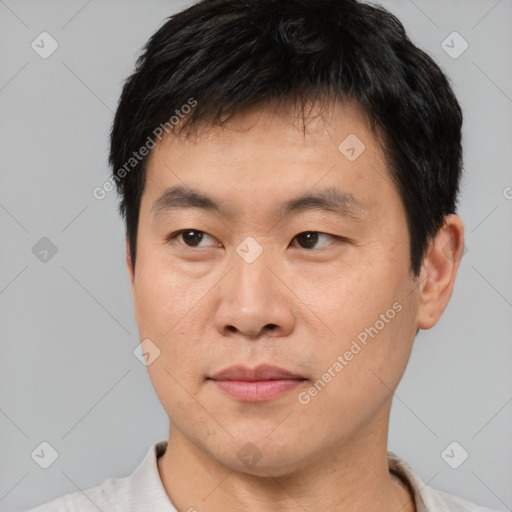 Neutral asian young-adult male with short  black hair and brown eyes