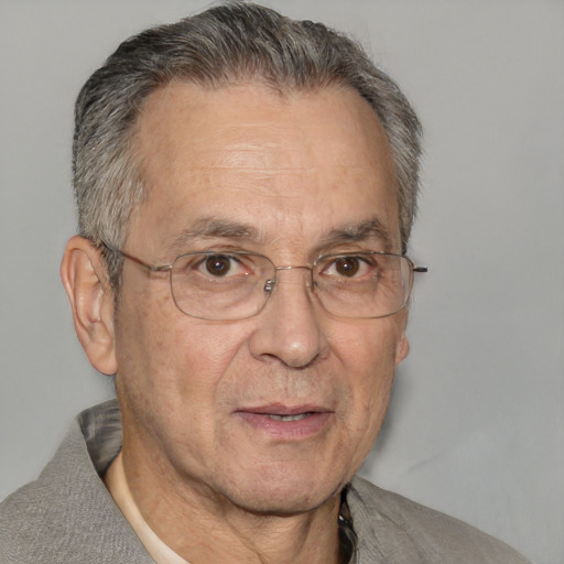 Neutral white middle-aged male with short  gray hair and brown eyes