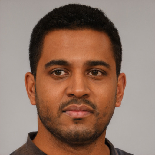 Neutral black young-adult male with short  black hair and brown eyes