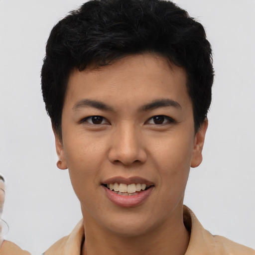 Joyful asian young-adult female with short  black hair and brown eyes