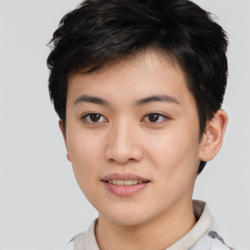 Joyful asian young-adult female with short  brown hair and brown eyes