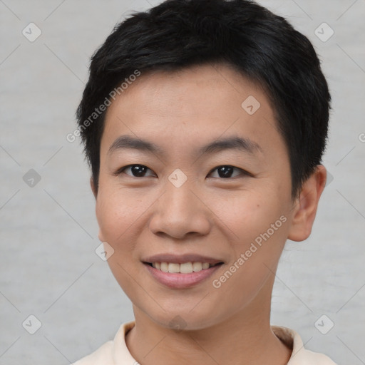 Joyful asian young-adult male with short  brown hair and brown eyes