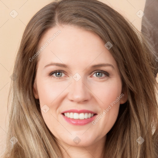 Joyful white young-adult female with long  brown hair and green eyes