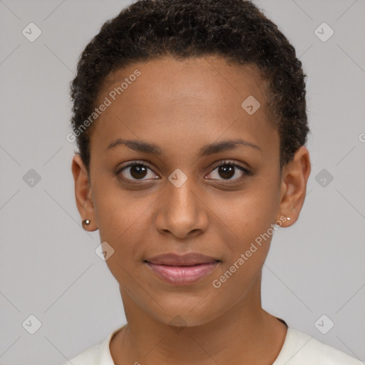 Joyful black young-adult female with short  brown hair and brown eyes