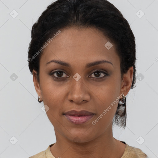 Joyful black young-adult female with short  brown hair and brown eyes