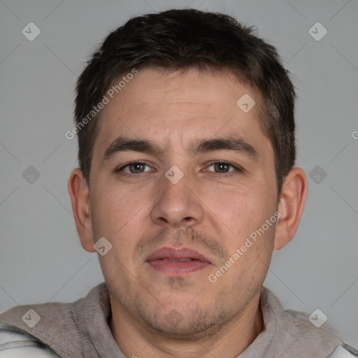 Neutral white adult male with short  brown hair and brown eyes