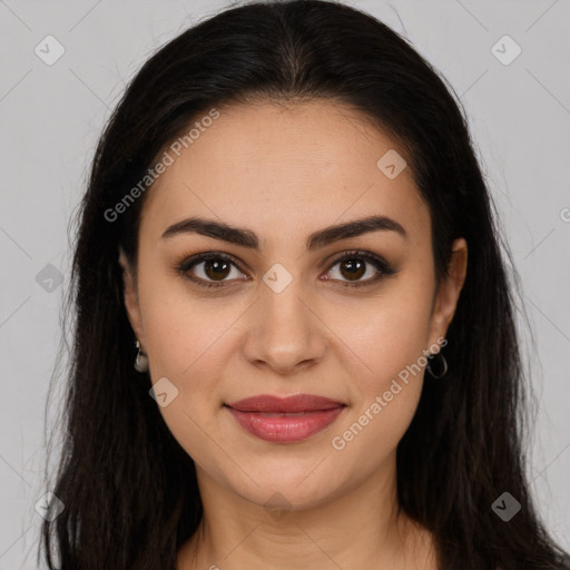 Joyful latino young-adult female with long  brown hair and brown eyes