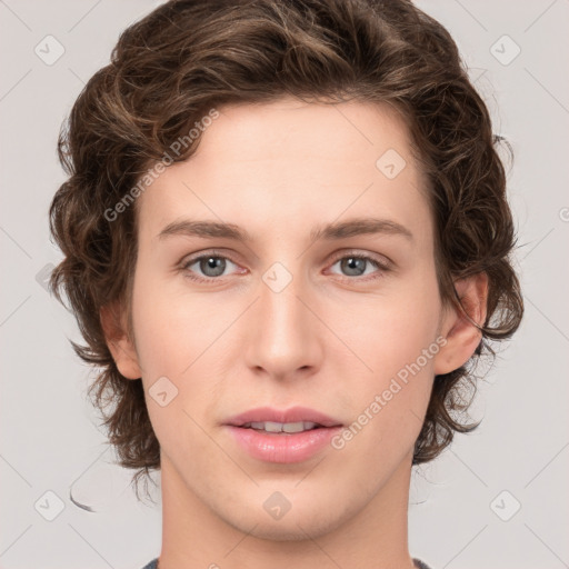 Joyful white young-adult female with medium  brown hair and green eyes