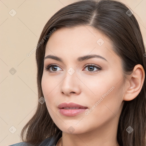 Neutral white young-adult female with long  brown hair and brown eyes