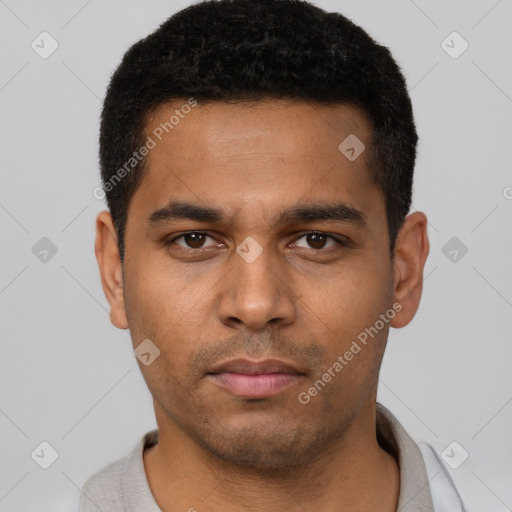 Neutral latino young-adult male with short  black hair and brown eyes