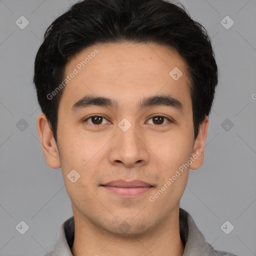 Joyful white young-adult male with short  black hair and brown eyes