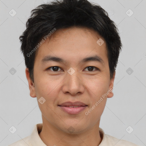 Joyful asian young-adult male with short  brown hair and brown eyes