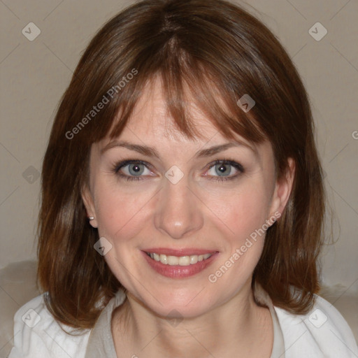 Joyful white young-adult female with medium  brown hair and blue eyes