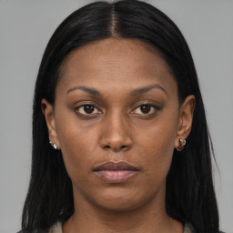 Neutral black young-adult female with long  black hair and brown eyes