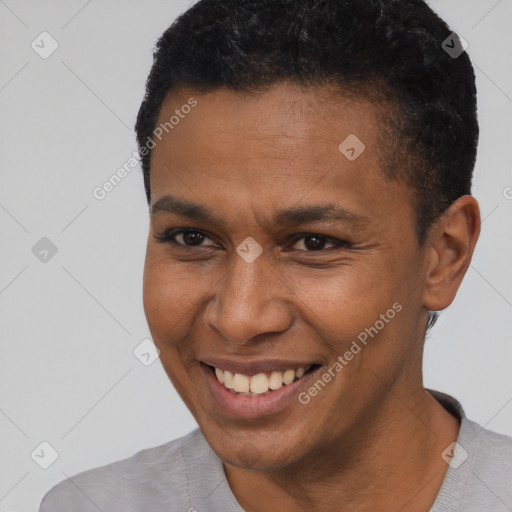 Joyful black young-adult male with short  black hair and brown eyes