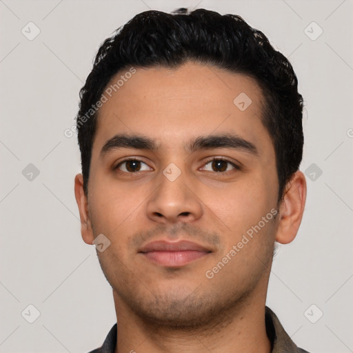 Neutral latino young-adult male with short  black hair and brown eyes