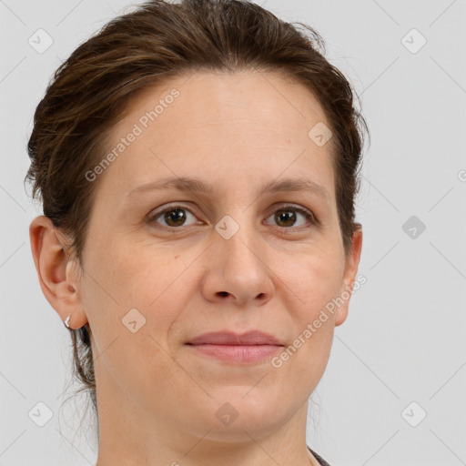 Joyful white adult female with short  brown hair and grey eyes