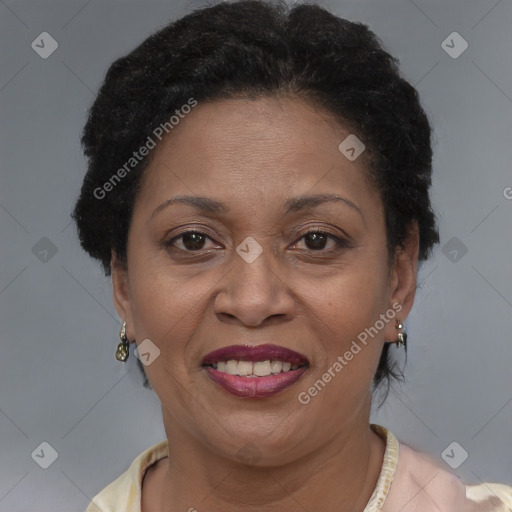 Joyful black adult female with short  brown hair and brown eyes