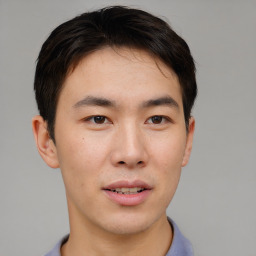 Neutral asian young-adult male with short  brown hair and brown eyes