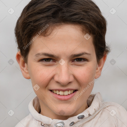 Joyful white child male with short  brown hair and brown eyes