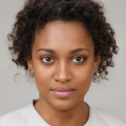 Neutral black young-adult female with short  brown hair and brown eyes